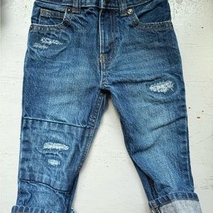 Oshgosh Ripped jeans with zipper and snap . 18mos